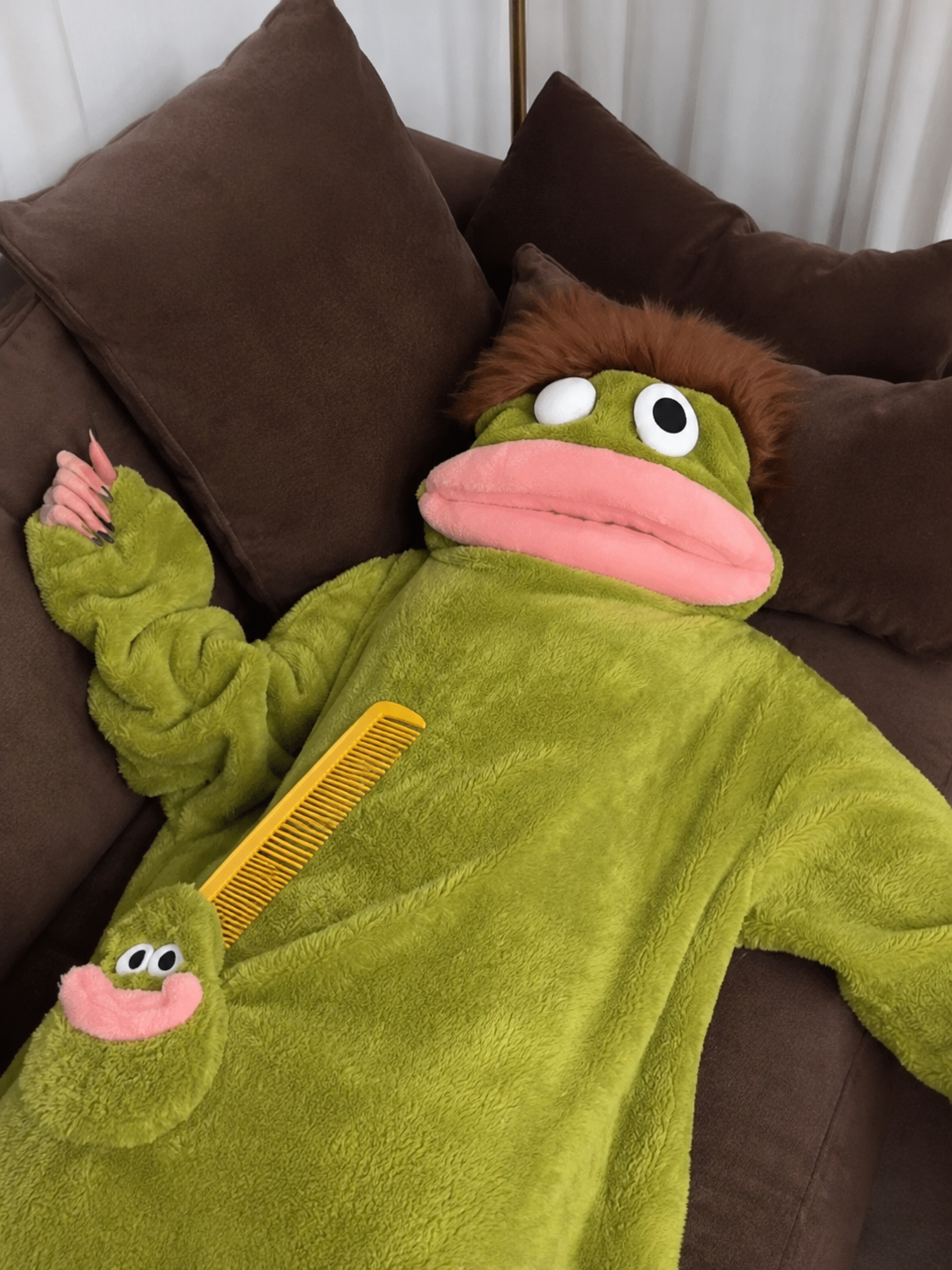 Green Snuggle onesie with mega comb